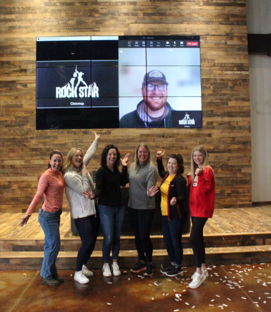 7 of the 11 award winners of Clickstop's quarterly employee awards.