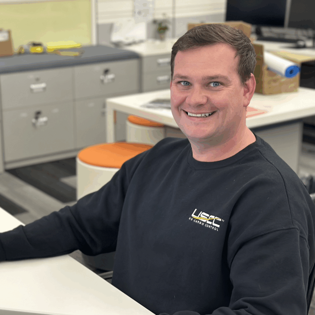Photo of Jon Wolff working onsite at the Clickstop Office in Urbana, Iowa. Jon's record sale illustrates that Enterprise Sales Strategy and Team Collaboration go hand in hand.