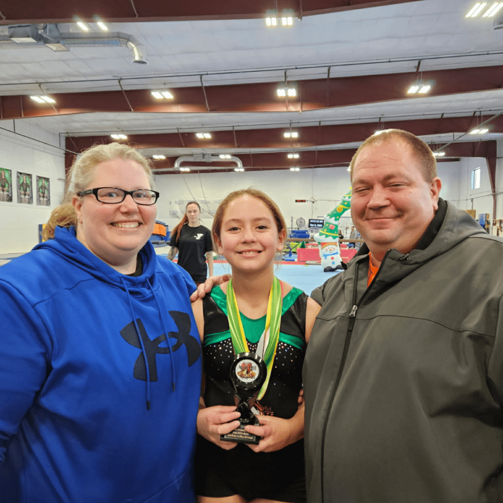 Rhonda Daisy during her sabbatical celebrating her daughter at her gymnastics competition.