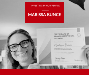 Marissa Bunce holding her Leadership Foundations program certificate after completing leadership development training at Clickstop.